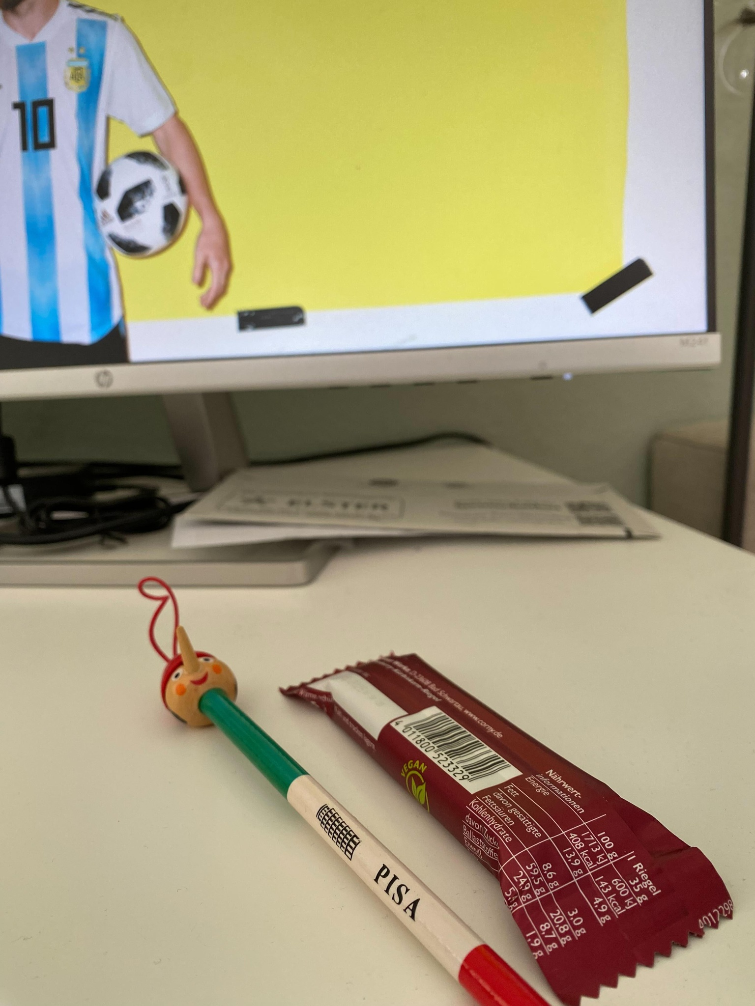 Out-of-focus monitor displaying HP logo